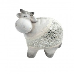Dekoracyjna figurka krowy z kawałkami szkła na prezent